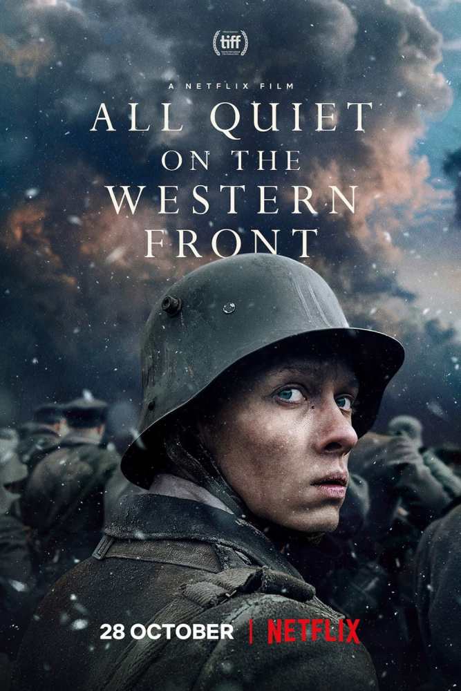 Poster for the film 'All Quiet on the Western Front' featuring a soldier in a helmet looking back, surrounded by a chaotic, smoky battlefield. The title and release date are prominently displayed.